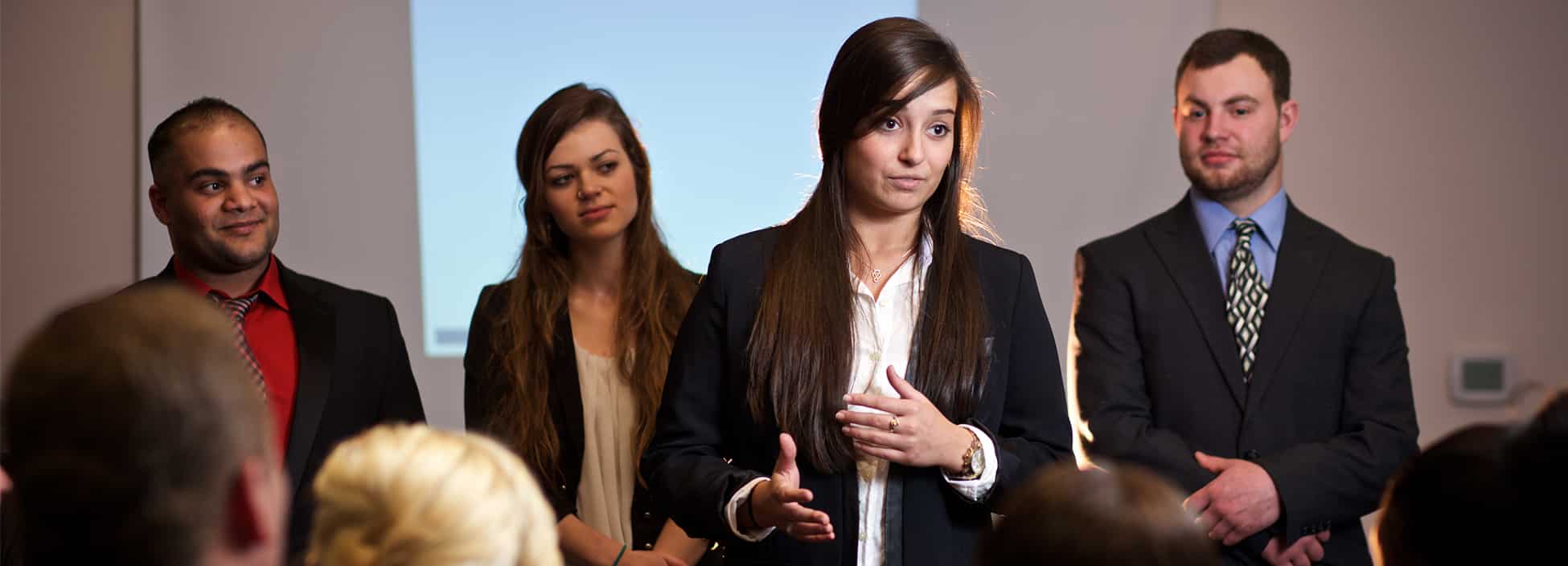 Students get practice with business presentations, business technology and management