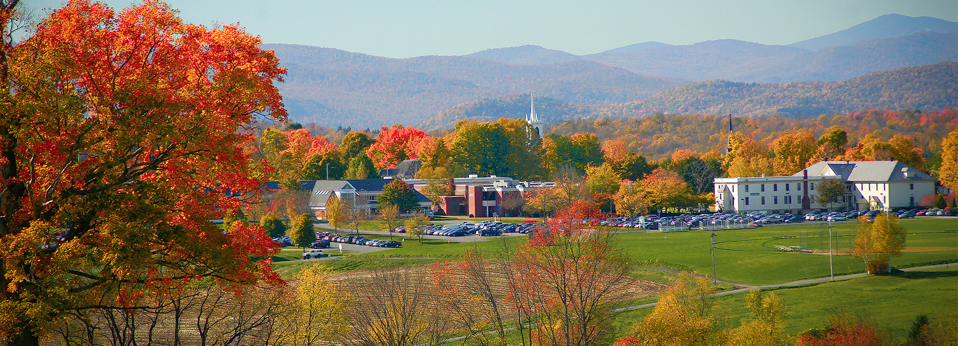 A view of the Randolph Center Campus in the fall, mountains