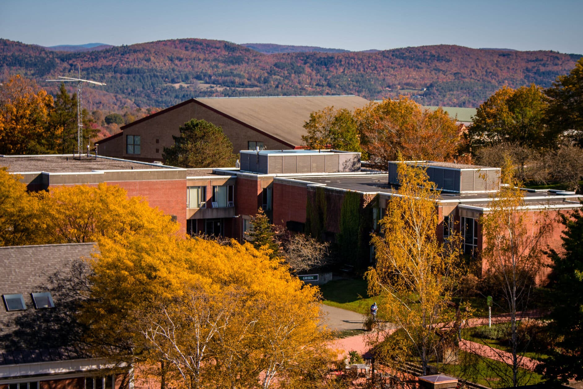 An aerial photo of the Randolph Center campus in fall showing buildings and colorful foliage