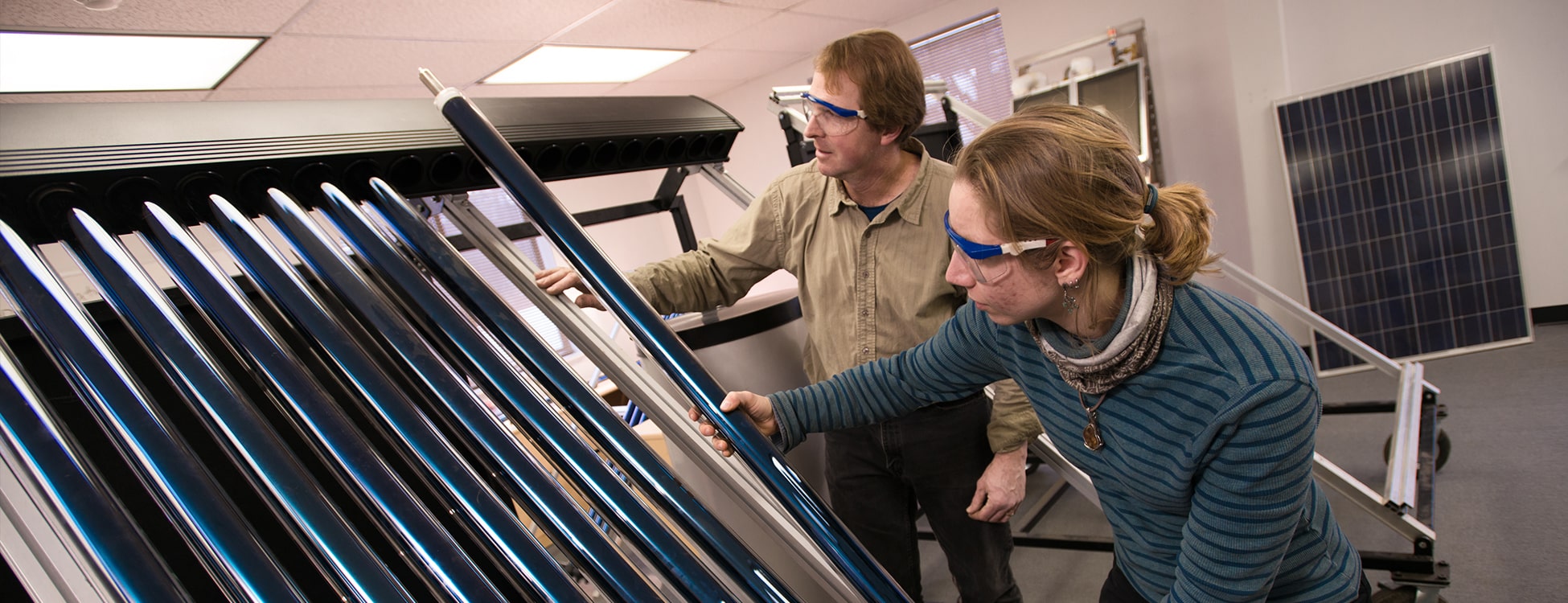 renewable energy, female student, male faculty, teaching, hands on