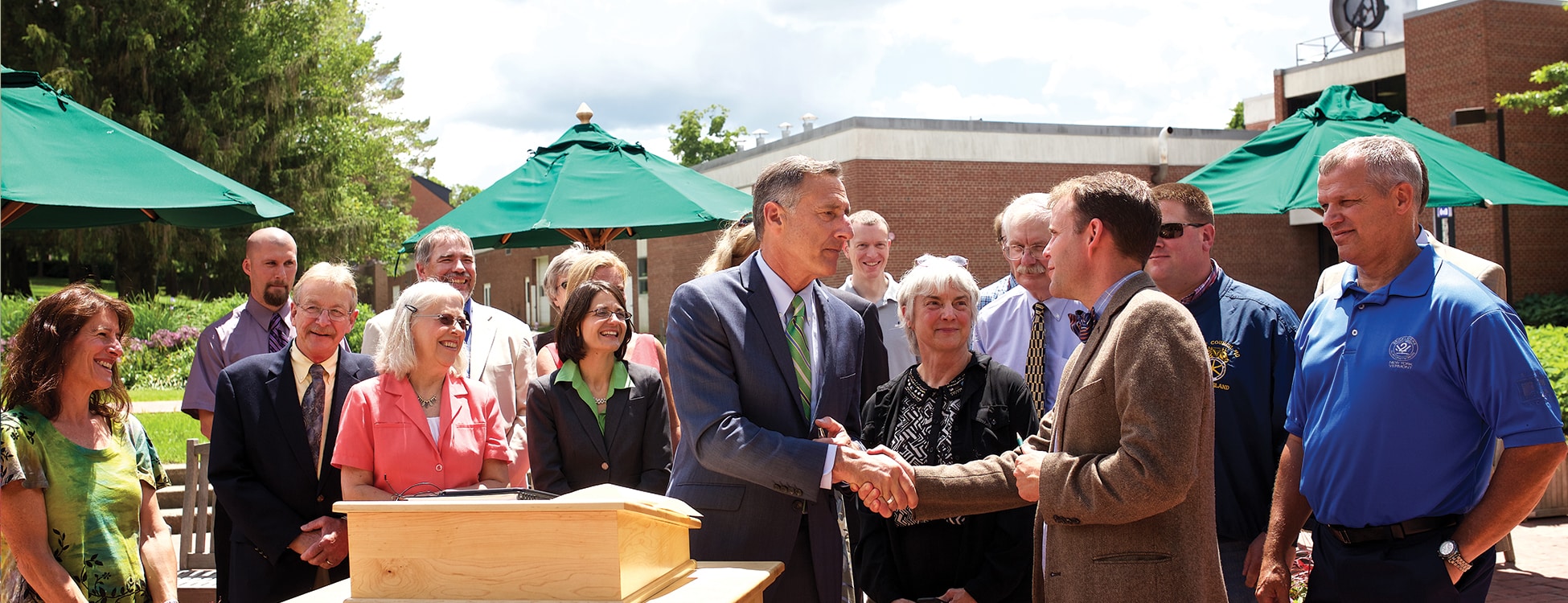 Governor Shumlin, Vermont, shaking hands, outside, press conference, Randolph Center campus