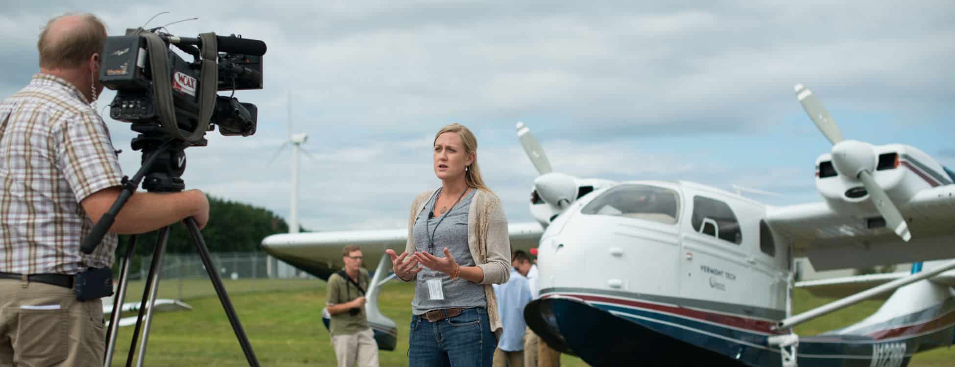 female student, professional pilot technology, sea plane, press conference