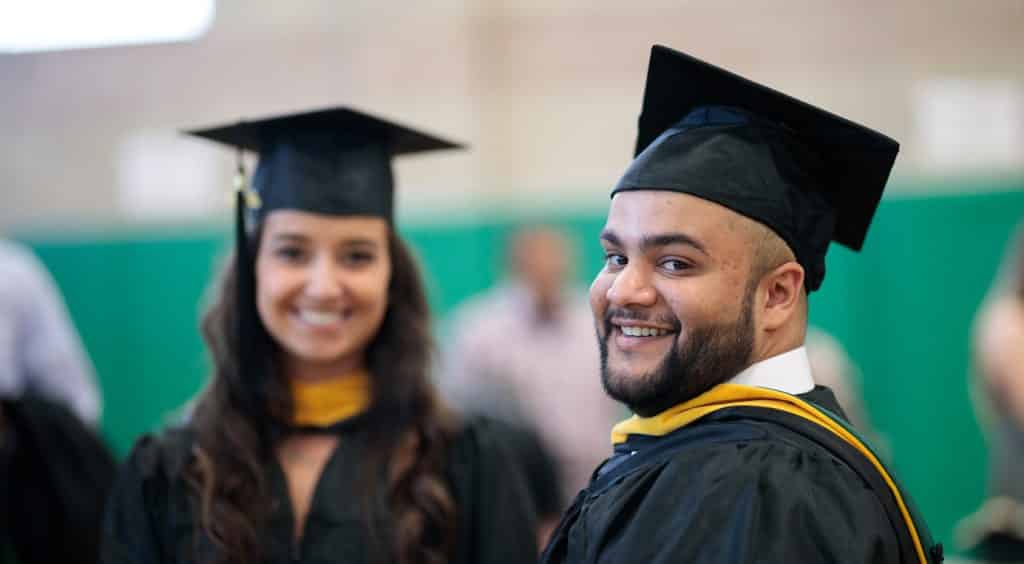 commencement, graduation, male student, female student, smiling