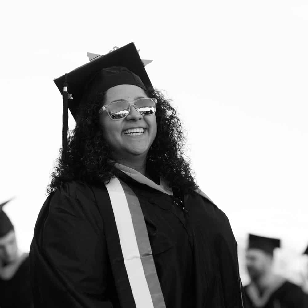 Female student, Deema, graduation, commencement, smiling