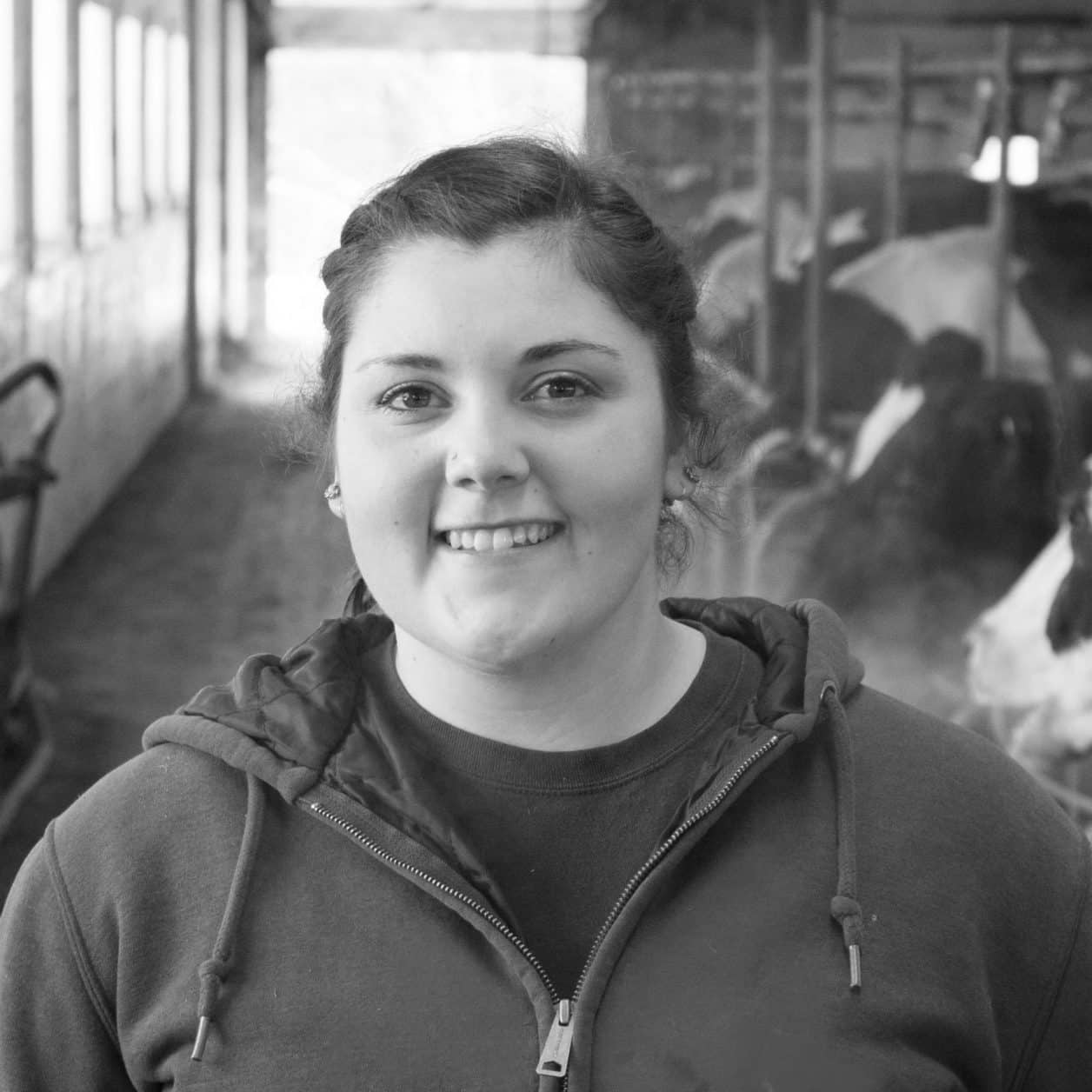 Female student, agriculture, dairy farm, smiling