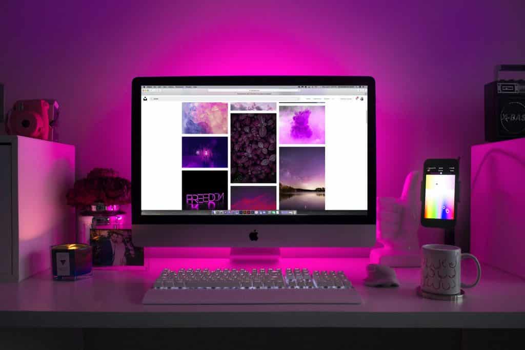 Desktop computer and cell phone on a desk