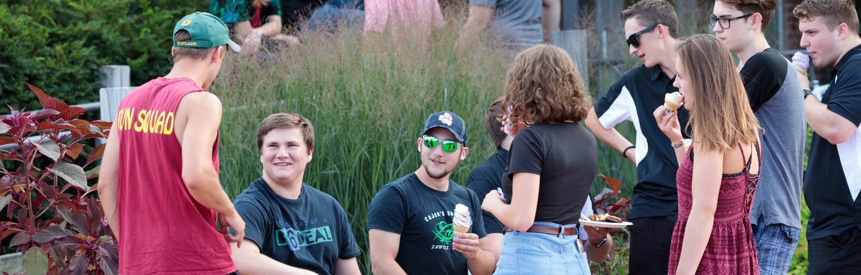 Male students, female students, chatting, talking, warm, smiling