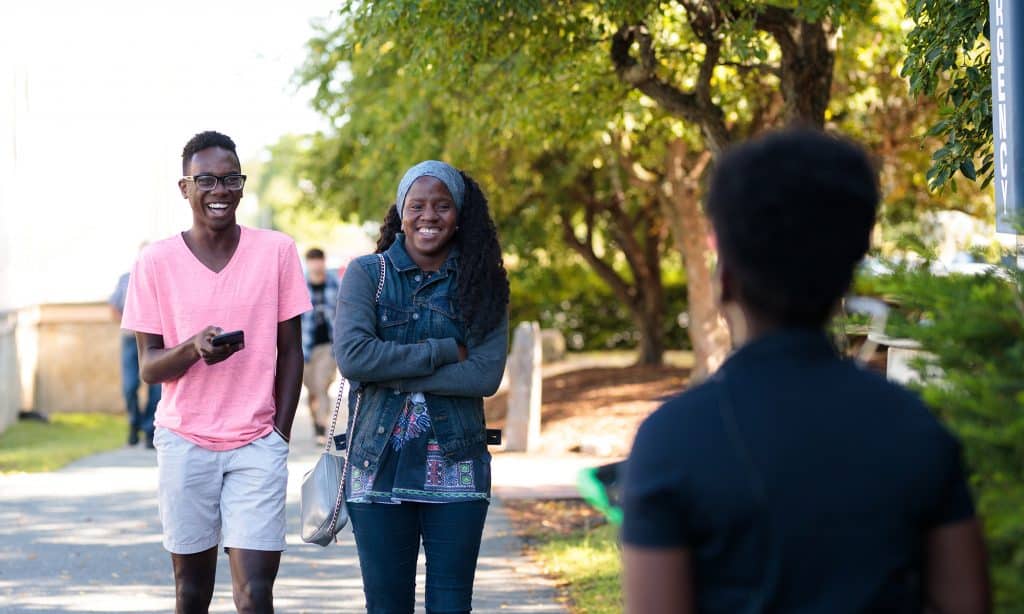 mother, son, diversity, smiling, welcoming