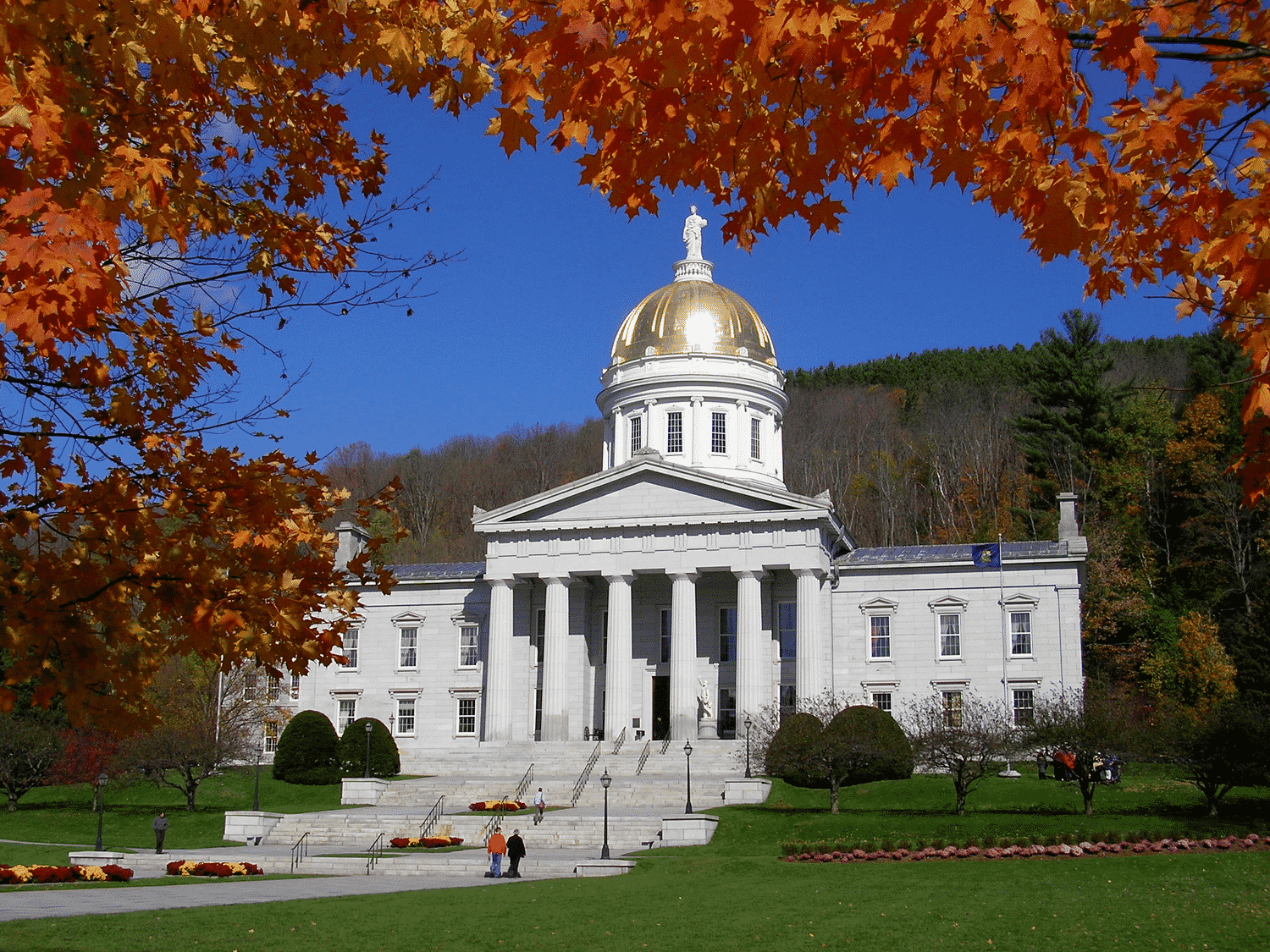 Exterior photo of the Vermont Statehouse in fall