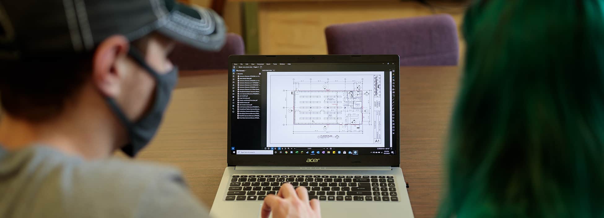 construction management students learn to read CADD plans on the computer