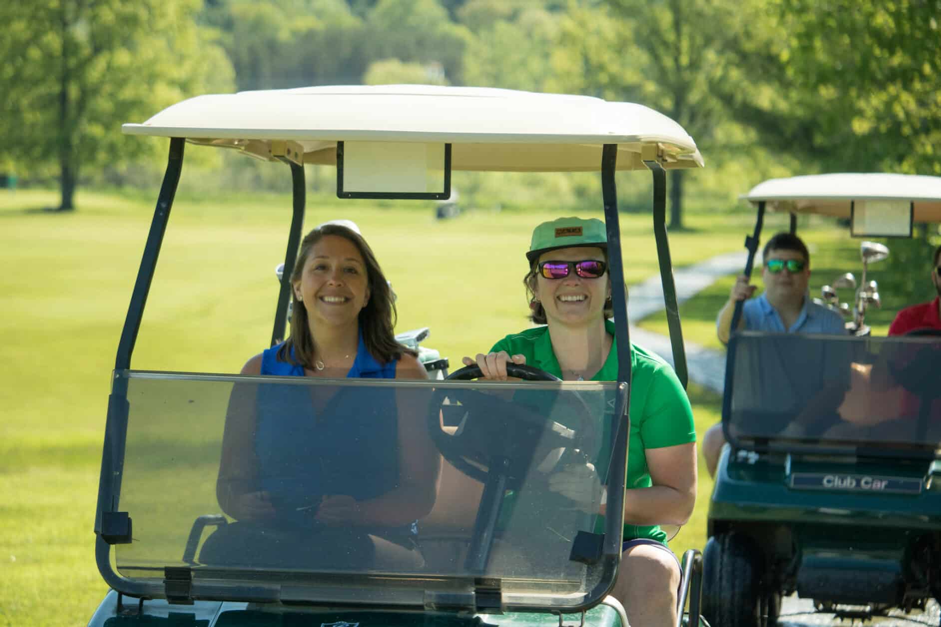 Female golfers at alumni golf tournament