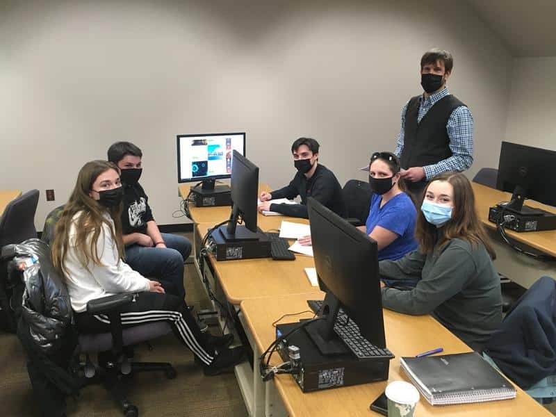 Nathan Mascolino, P.E. (standing), with students (clockwise from left) Cassandra Pelkey, Nicholas Tibbets, James Weishaar, Anna Noble, and Elinore Vranjes