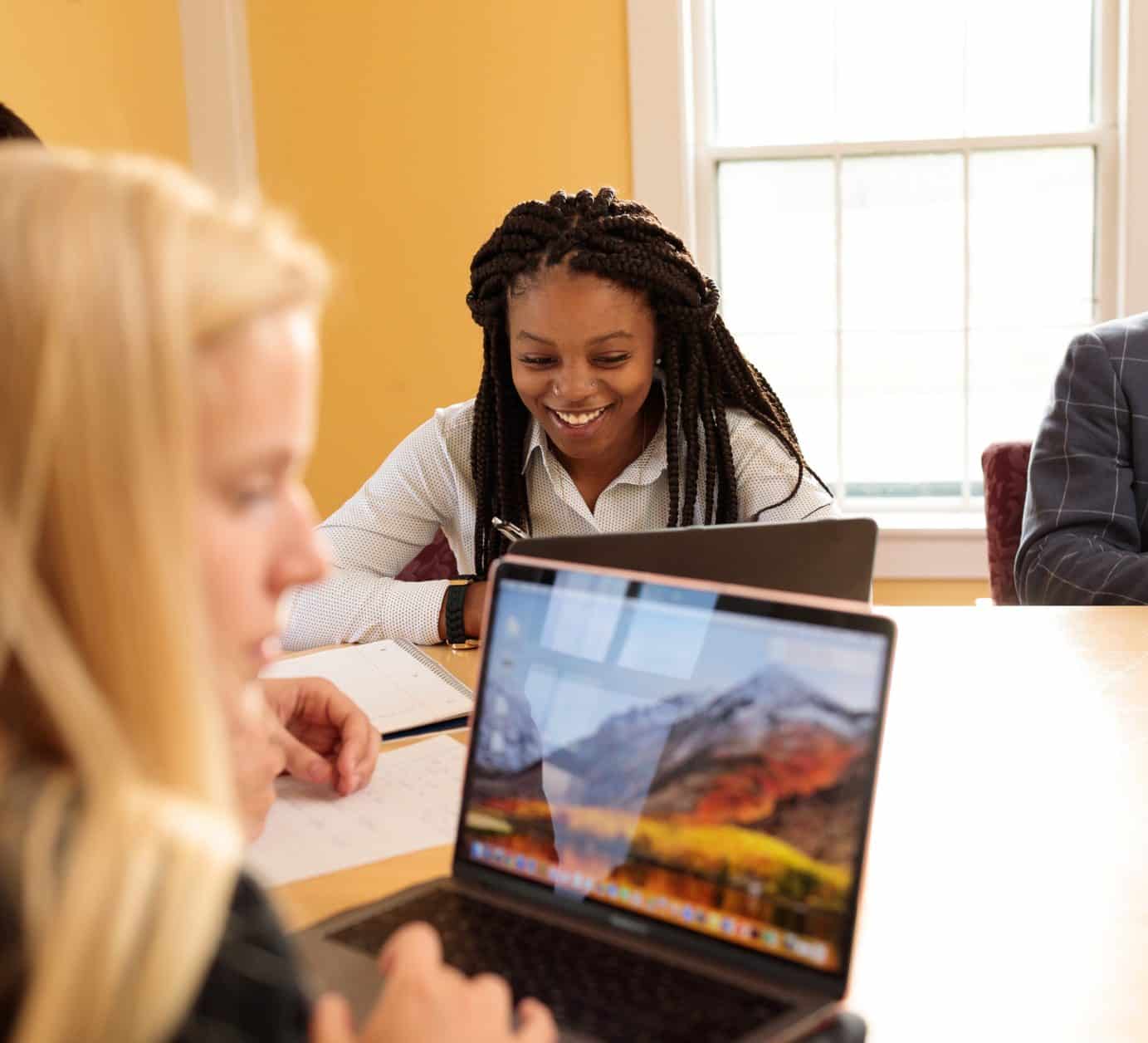 Female students, business technology and management, conference room, lap top, diversity